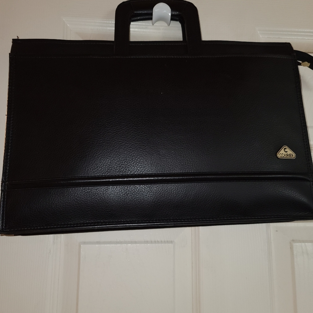 Briefcase with pull out handles